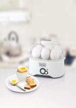 Load image into Gallery viewer, BLACK+DECKER 280W 6 Piece Egg Cooker EG200-B5 - Teq Souq